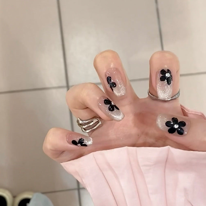 Artificial nail set with elegant flower design and glamorous accents Bowlift