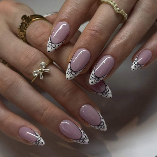 Artistic Stiletto Nails with Elegant Floral Design Bowlift