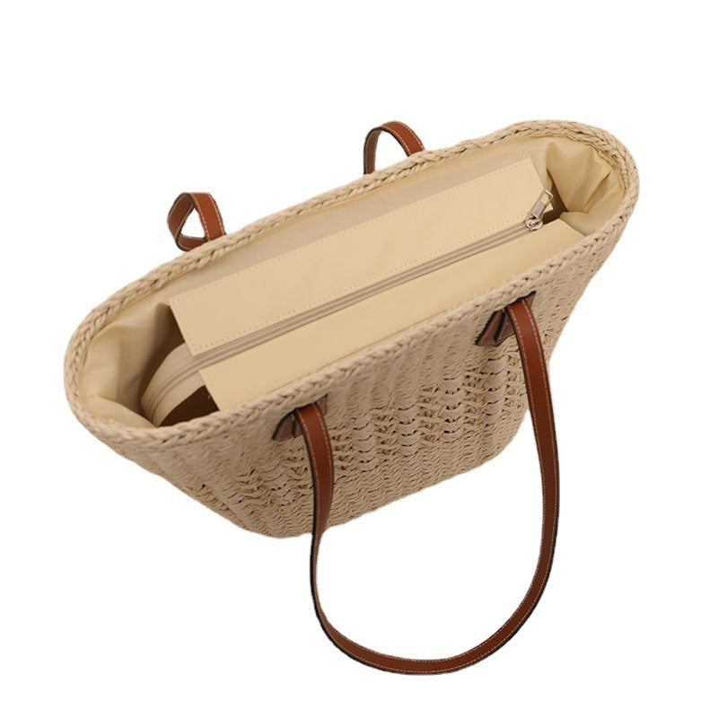 Handcrafted rattan basket bag with elegant leather accents Bowlift