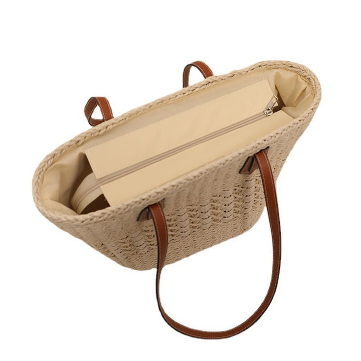 Handcrafted rattan basket bag with elegant leather accents Bowlift