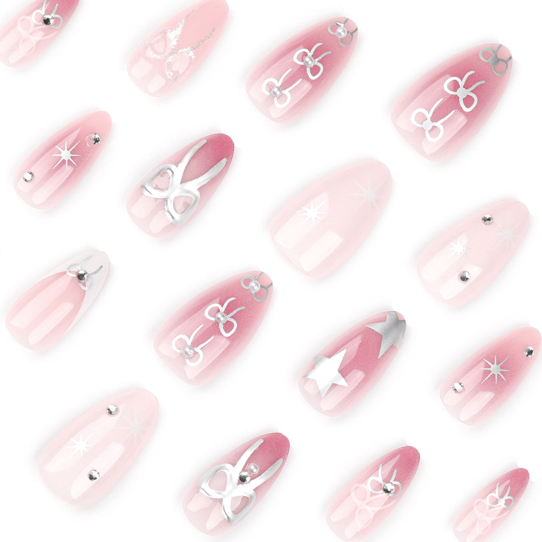 Artful nail extensions with elegant 3D embellishments Bowlift