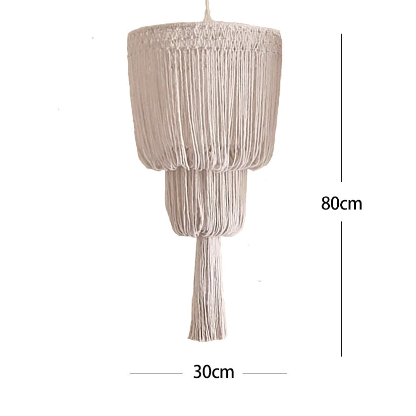 Macrame plant hanger with decorative fringes