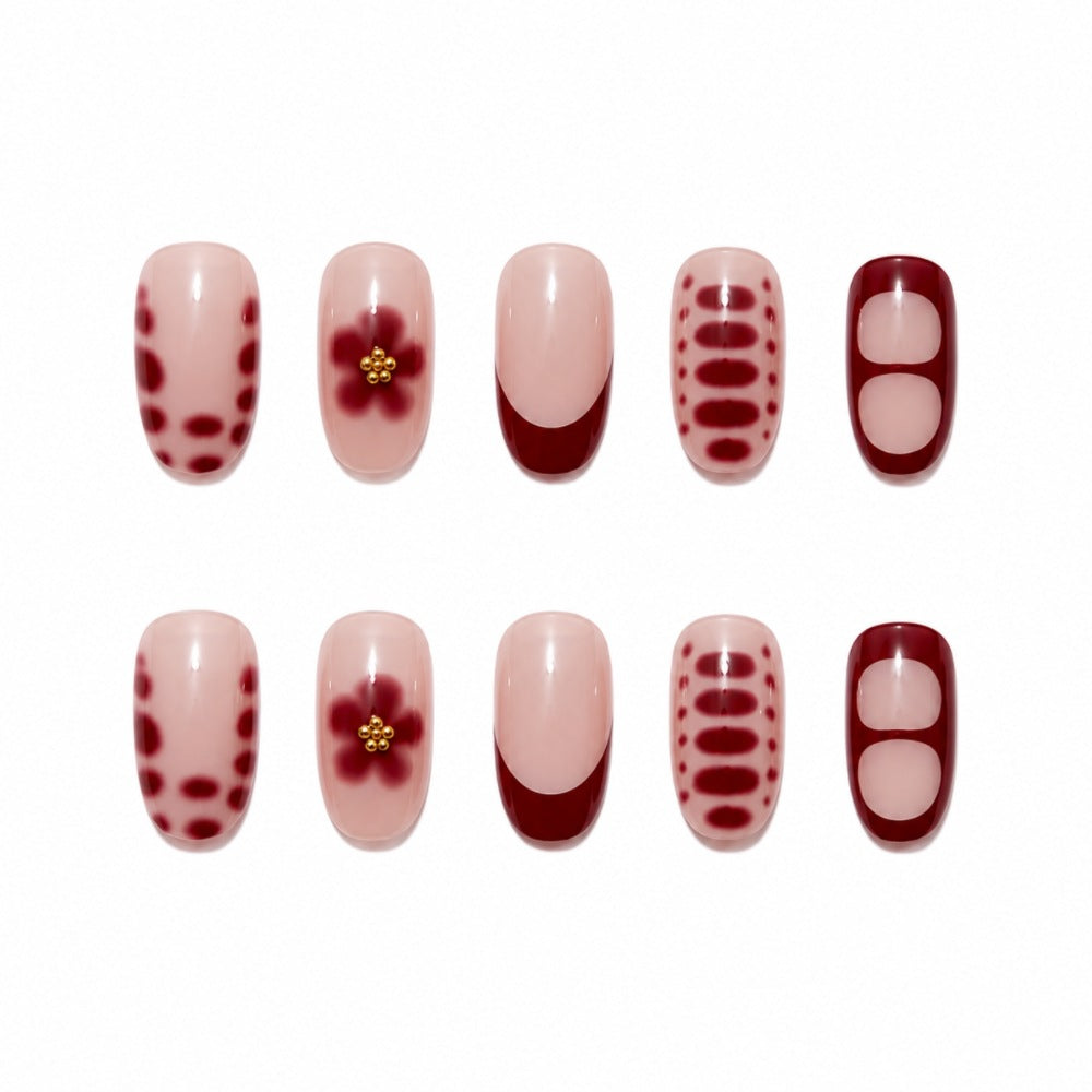 Artistic Press-On Nail Set with Floral Designs Bowlift