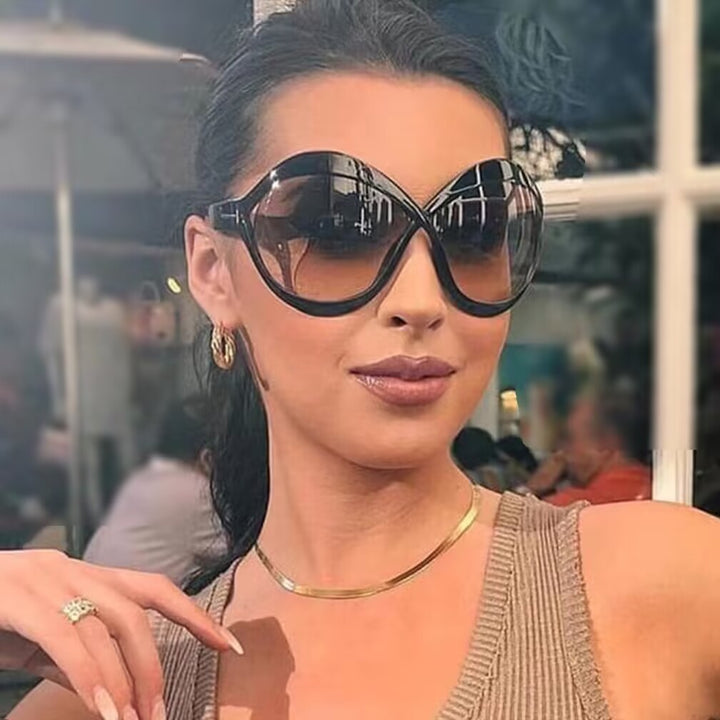 Women's extravagant Cat-Eye sunglasses with curved frame Bowlift