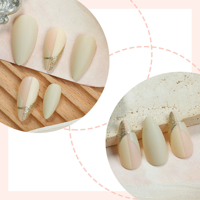 Elegant Press-On Nail Set with Artistic Gold Accents Bowlift