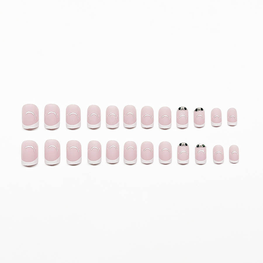 Art nail set with elegant French design and glittering accents Bowlift