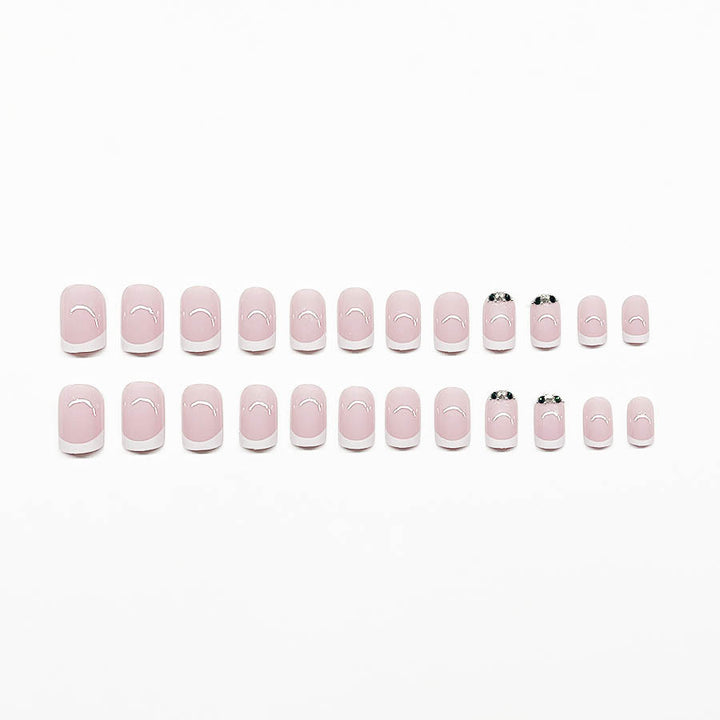 Art nail set with elegant French design and glittering accents Bowlift