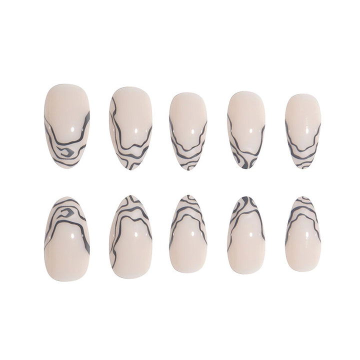 Elegant Stiletto Press-On Nail Set with Marble Detailing Bowlift