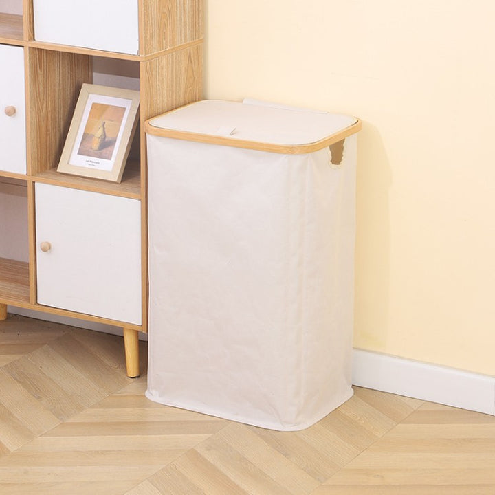 Stylish laundry basket with wooden lid Bowlift