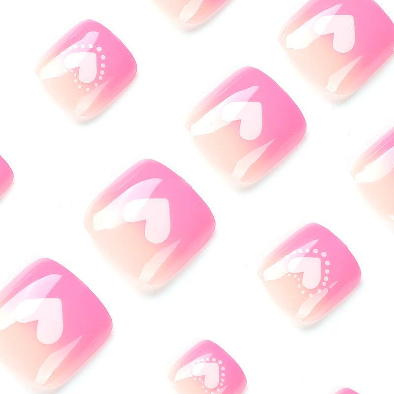 Artful toenail design with heart motifs Bowlift