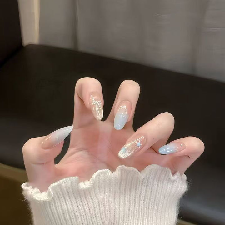 Artificial nails with elegant ombre look Bowlift