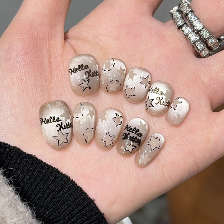 Artificial nail tips with Hello Kitty design Bowlift