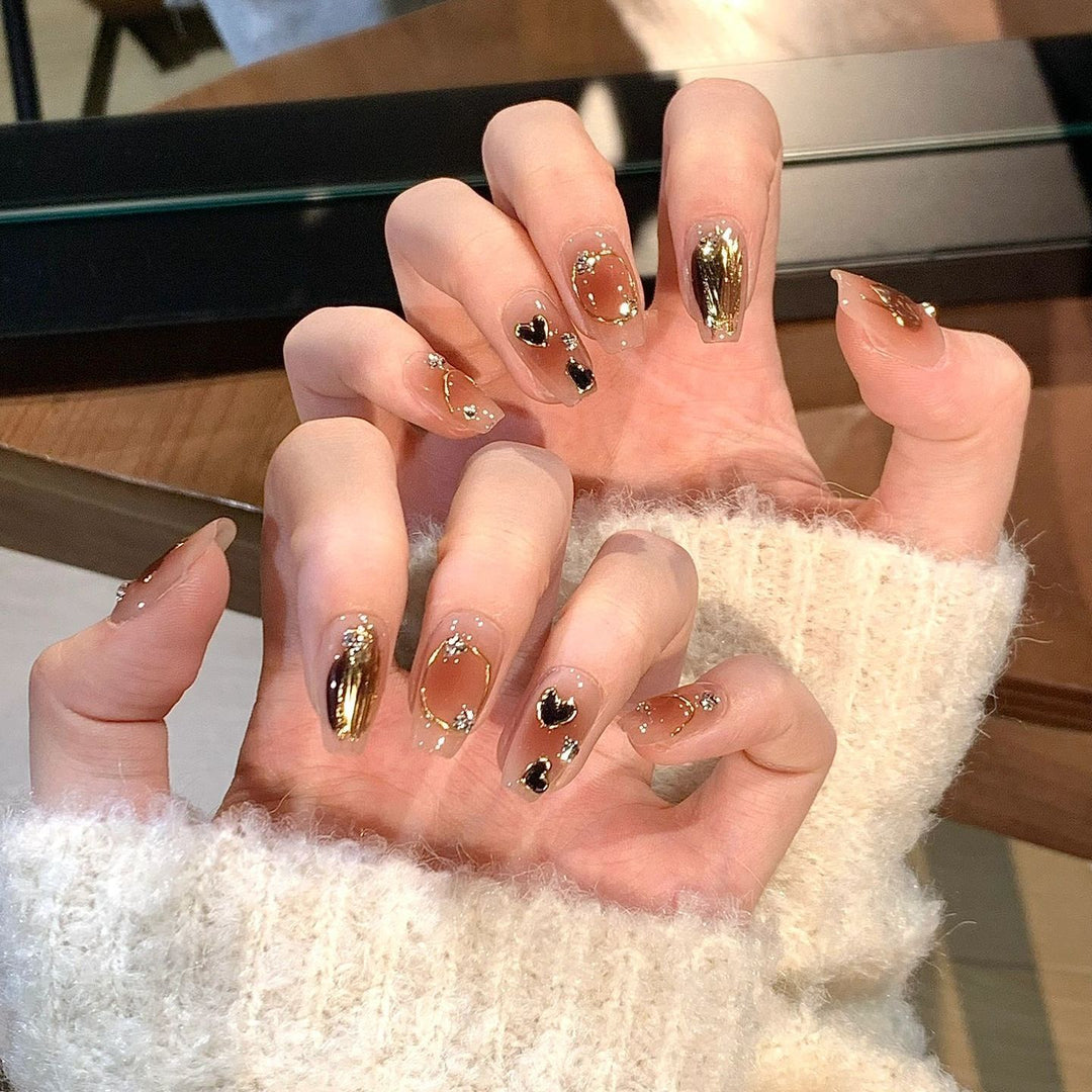 Artistic Press-On Nail Set with Heart and Glitter Accents Bowlift