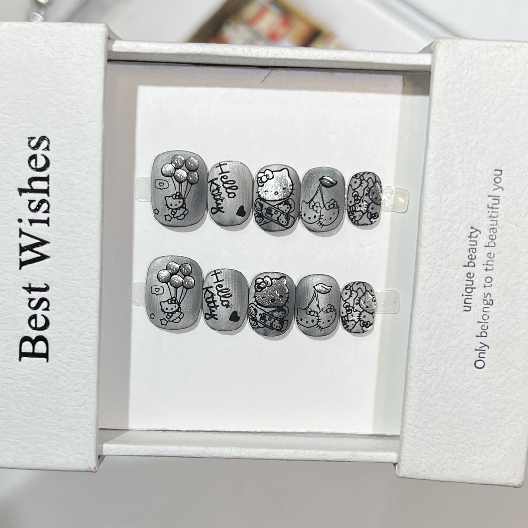 Artistic Press-On Nail Set with Whimsical Character Designs Bowlift
