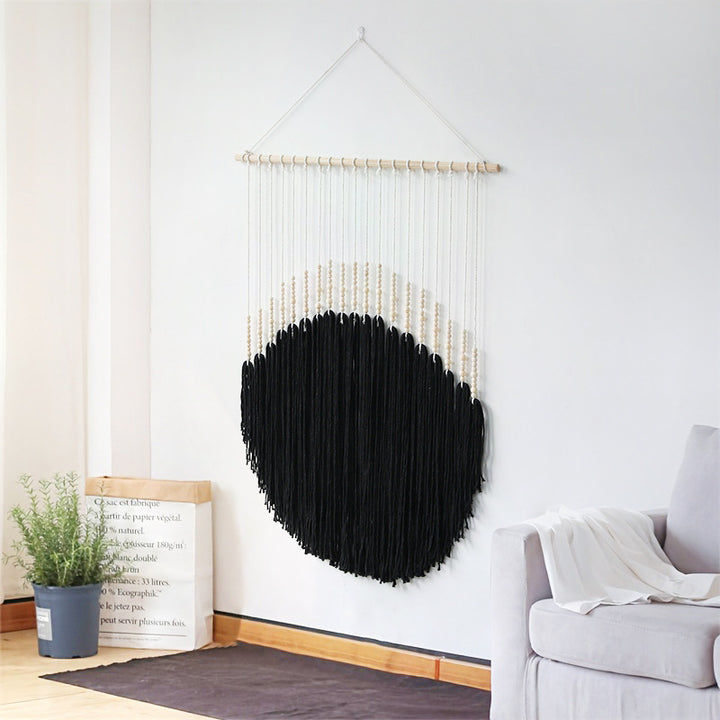 Decorative wall art with wooden beads and thread pendulum