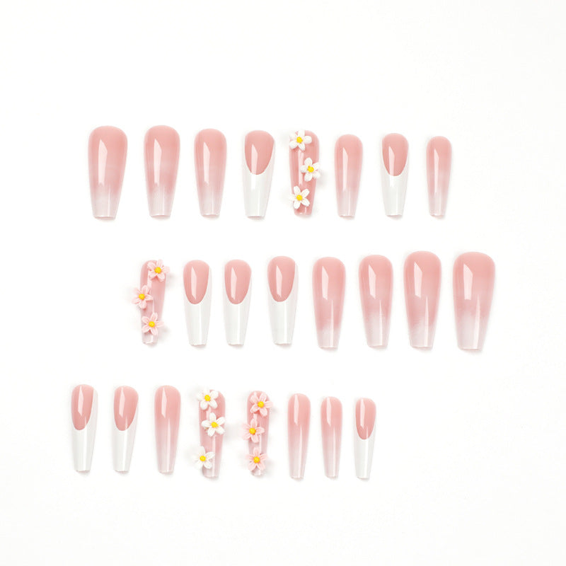 Artful nail extensions with elegant gradient and creative floral accents Bowlift