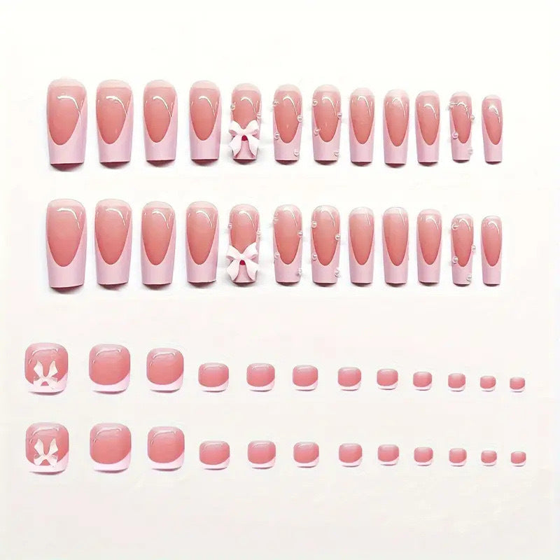 Artificial nail set with romantic bow and glitter details Bowlift