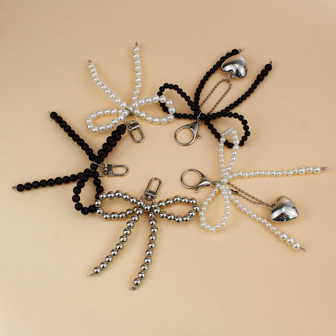 Elegant Pearl Bow Brooch Bowlift