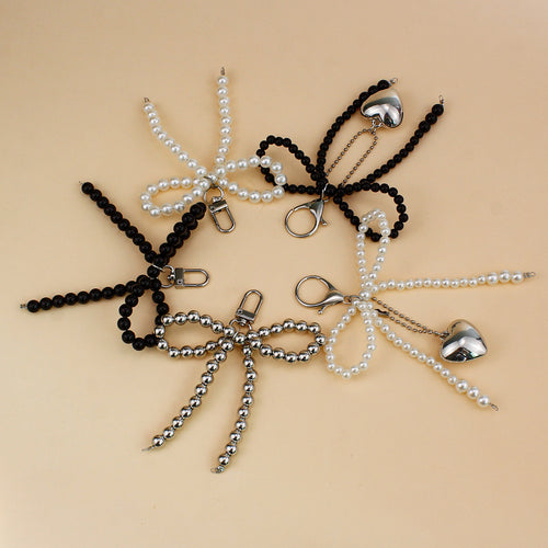 Elegant Pearl Bow Brooch Bowlift