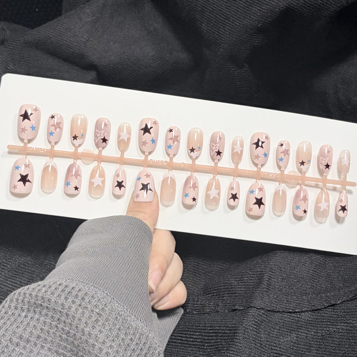 Artistic Press-On Nail Set with Star Designs Bowlift