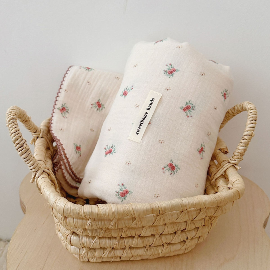 Unisex Muslin Blanket with delicate floral design and elegant ruffles Bowlift