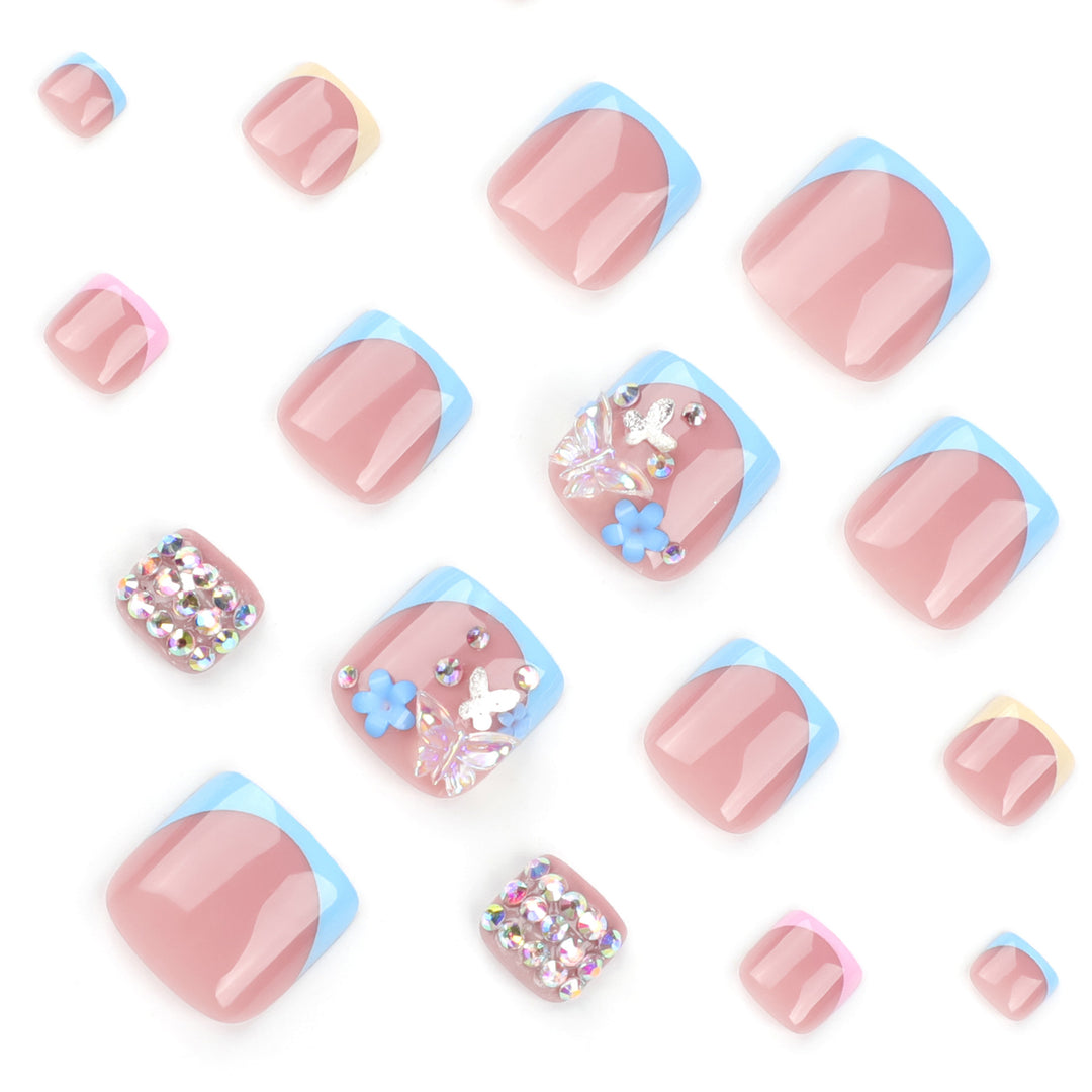 Artful toenail art with glitter and flower motifs Bowlift