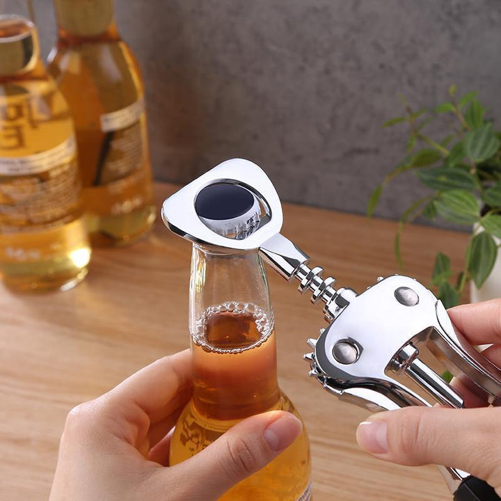 Winged corkscrew with integrated bottle opener and ergonomic rubberized lever handles Bowlift
