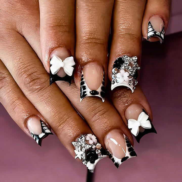 Acrylic nail set with glamorous golden accents Bowlift