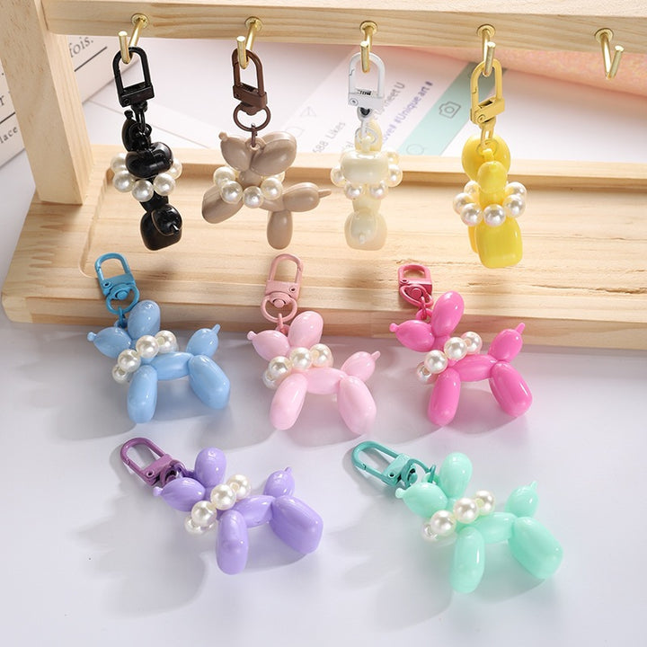 Playful keychain with balloon dog and beads Bowlift