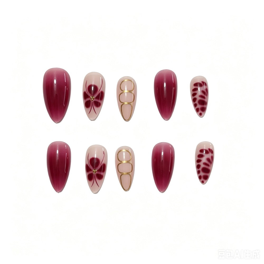 Artificial nails with elaborate flower designs and elegant accents Bowlift