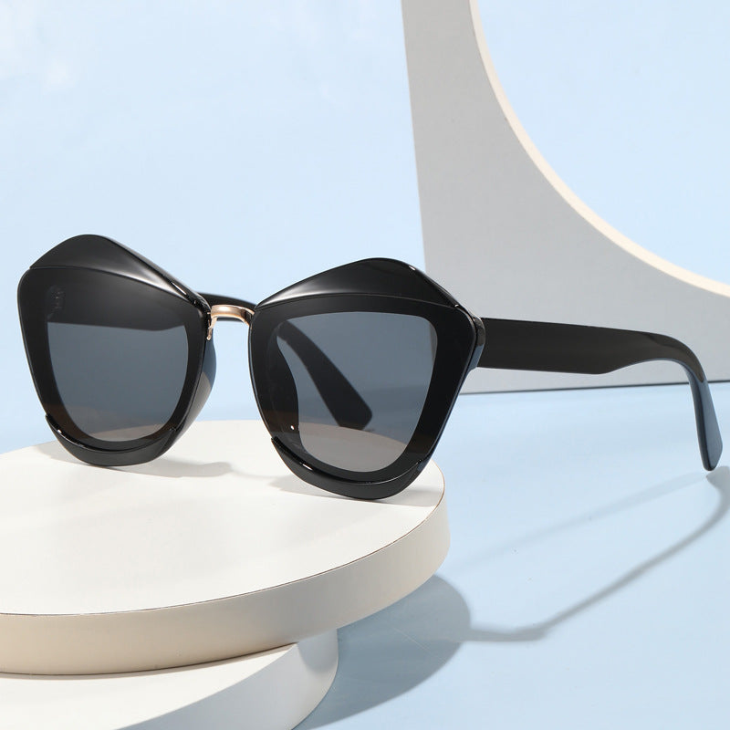 Women striking designer sunglasses with extravagant frame Bowlift