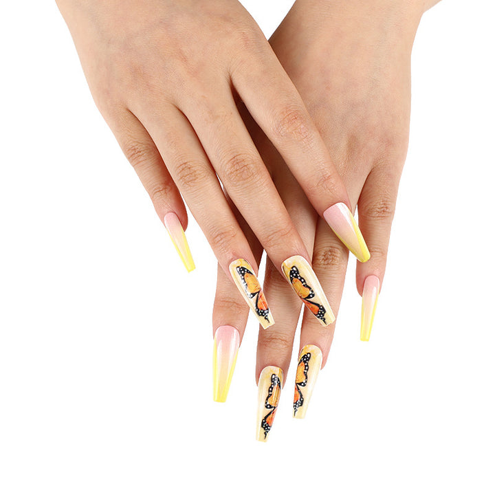 Art nails with butterfly motif Bowlift