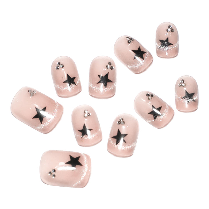 Artistic acrylic nails with glamorous star motifs Bowlift