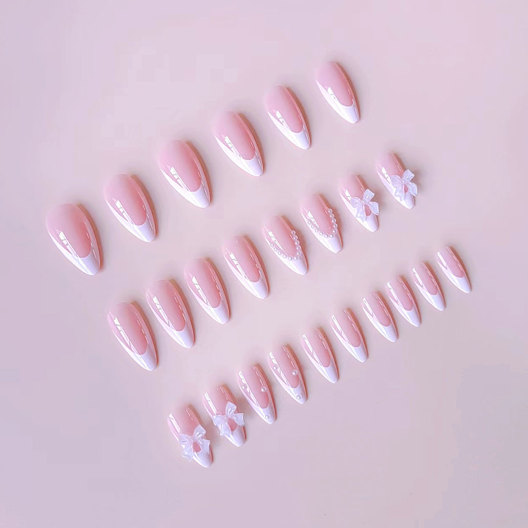 Nail art set with elegant tips and floral accents Bowlift