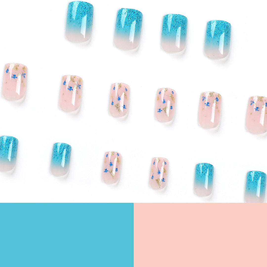 Artful acrylic nails with floral design and glitter effects Bowlift