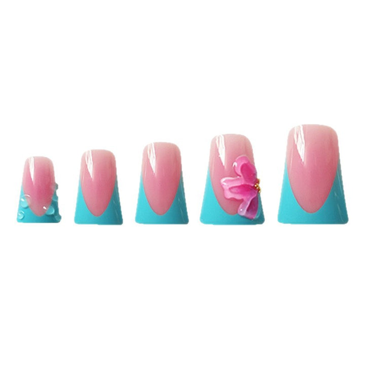 Artistic Press-On Nail Extensions with Floral Accents Bowlift