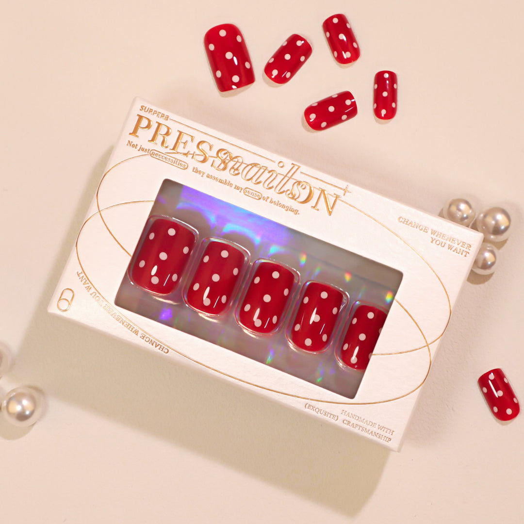 Artful Nail Art with Red Dots Bowlift