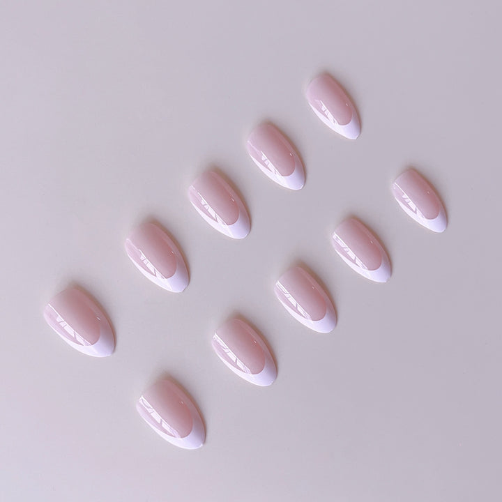 Artificial nail set with elegant French design and trendy accents Bowlift
