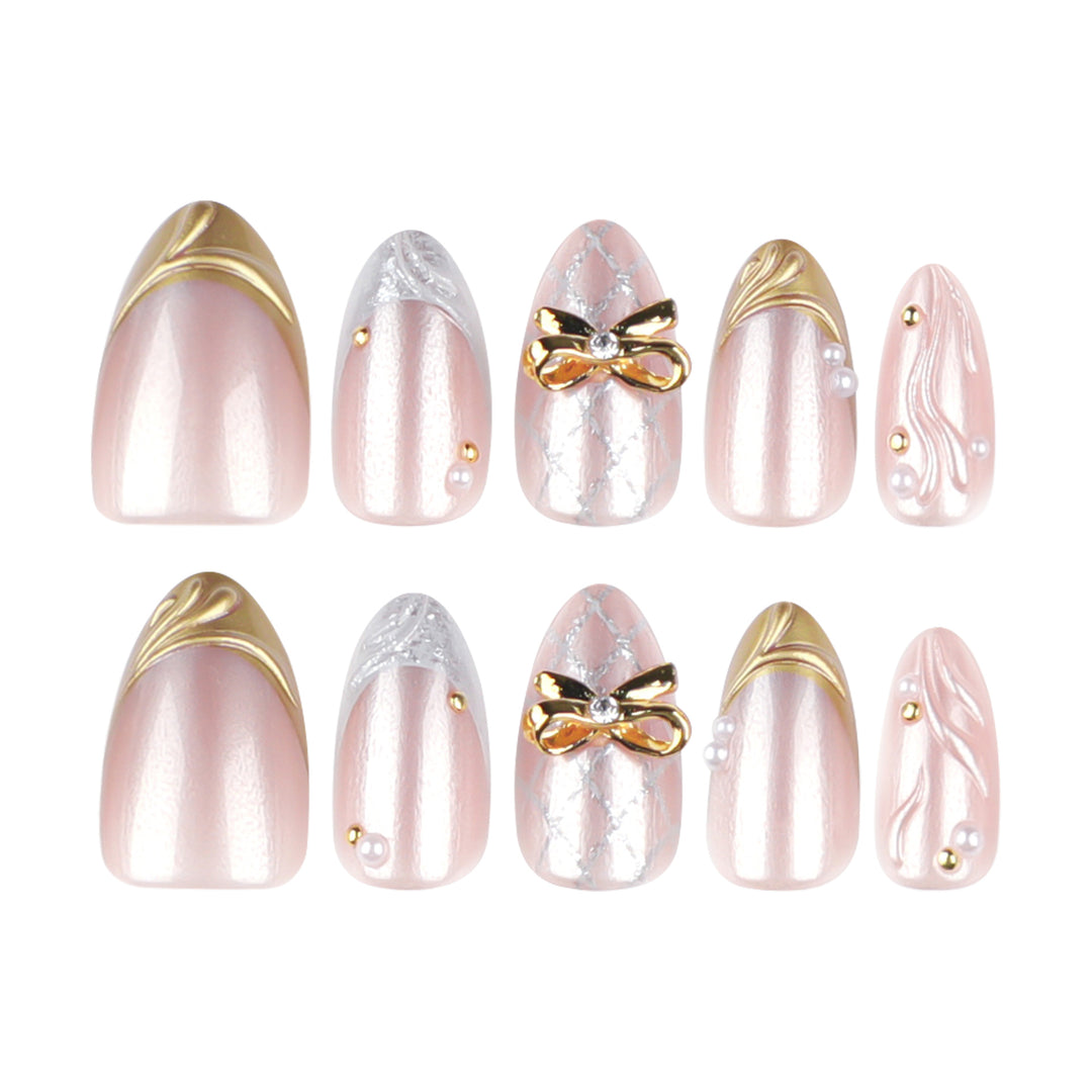 Artful stiletto nails with glitter and flower accents Bowlift