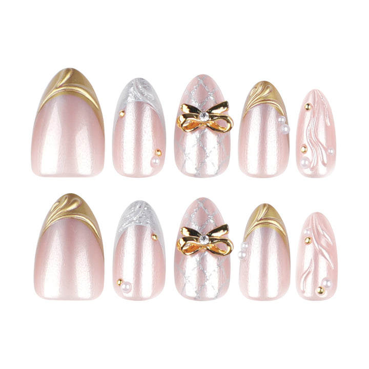 Artful stiletto nails with glitter and flower accents Bowlift