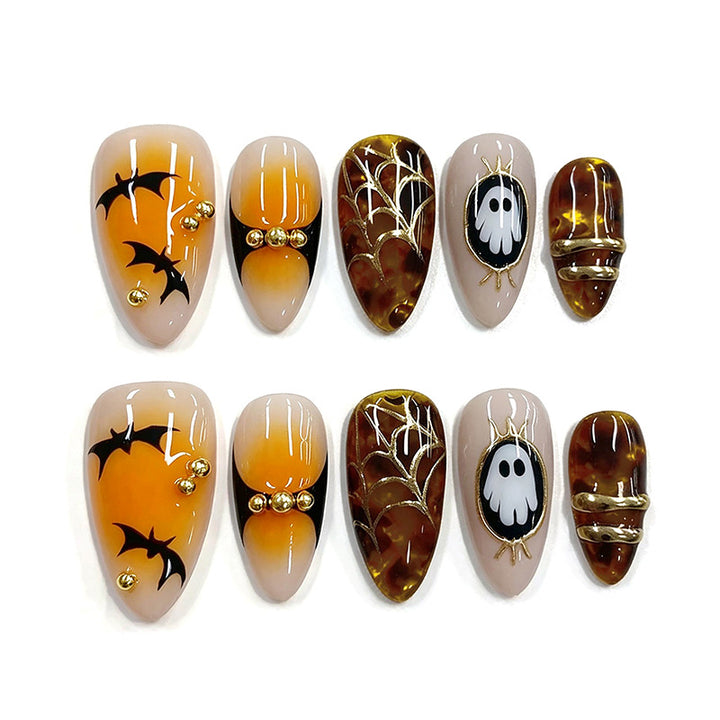 Artificial nails with Halloween motifs and glitter details Bowlift