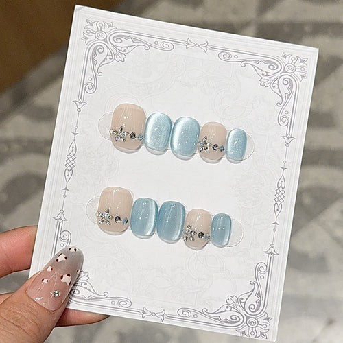 Elegant Artificial Nails with Radiant Accents Bowlift
