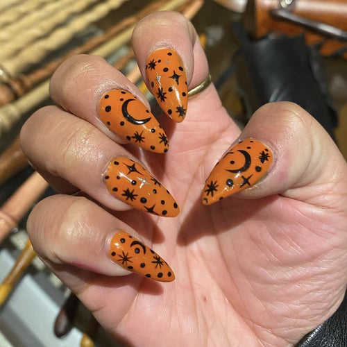 Artistic Press-On Nail Set with Cosmic Design Bowlift
