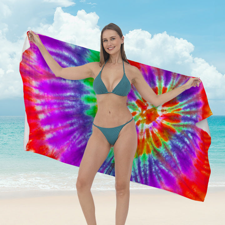 Beach towel with vibrant tropical plant motif Bowlift