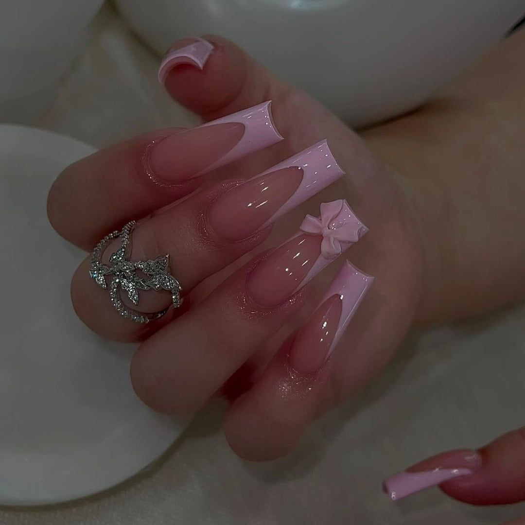 Artificial nail set with elegant tips and playful 3D design Bowlift
