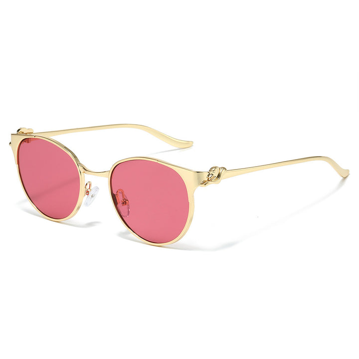 Elegant Cat-Eye Sunglasses with Decorative Gold Accents Bowlift