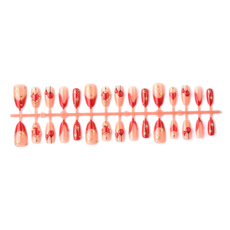 Elegant artificial nails with romantic gold and pearl embellishments Bowlift
