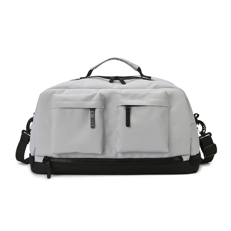 Sporty travel bag with two additional outer pockets Bowlift