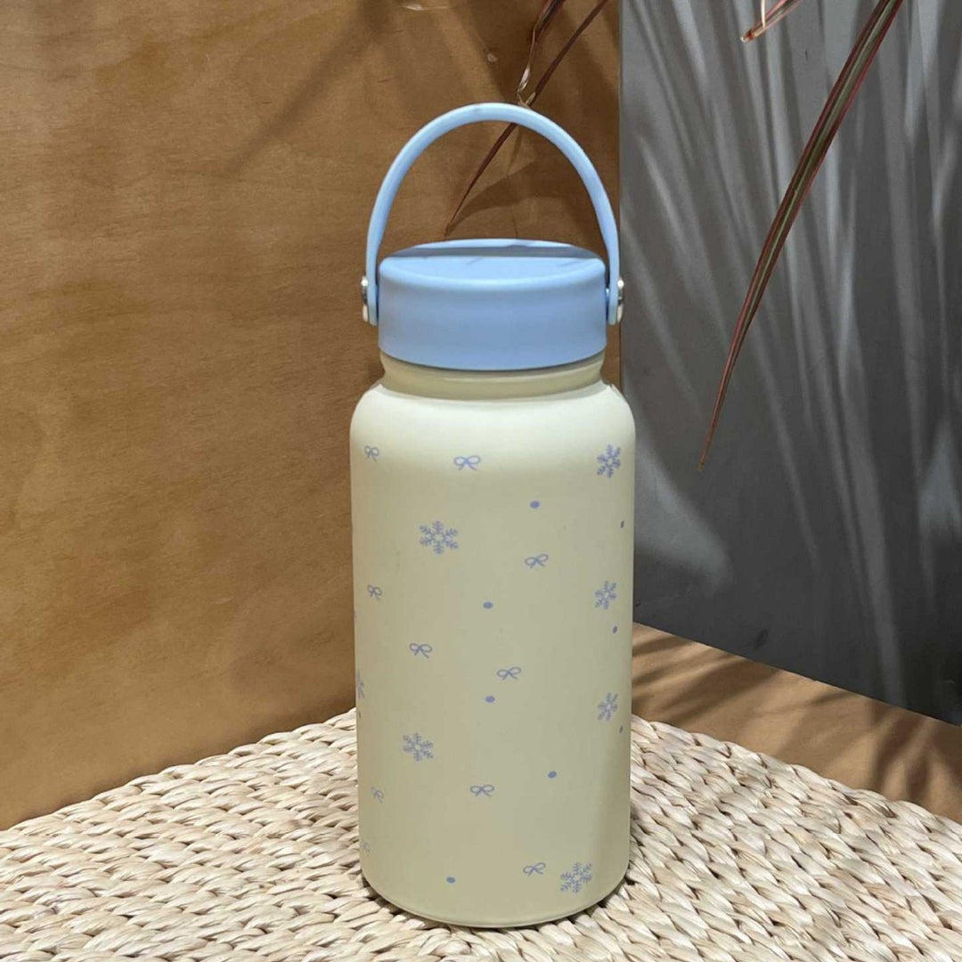 Women's insulated drinking bottle with practical carrying handle and cheerful design Bowlift