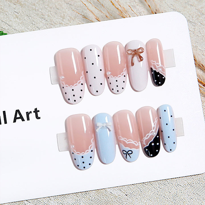Artificial nail set with elegant accents and fine designs Bowlift